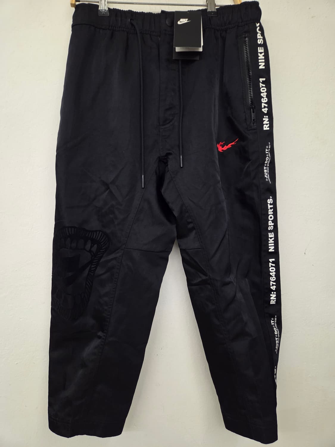 나이키 불꽃 스우시 우븐 트랙팬츠9부 상품이미지1