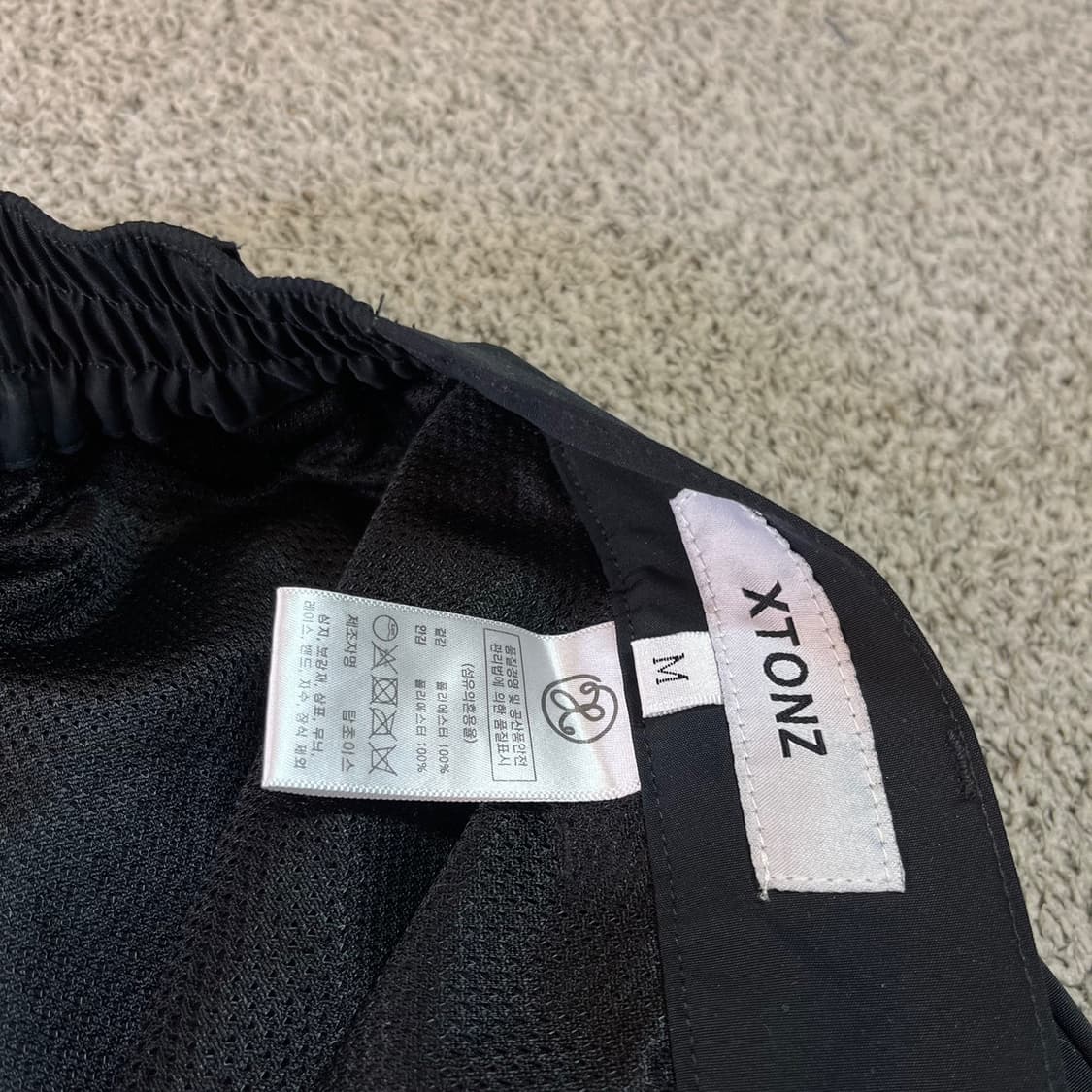 엑스톤즈 배색 커브드 트랙 팬츠 상품이미지4