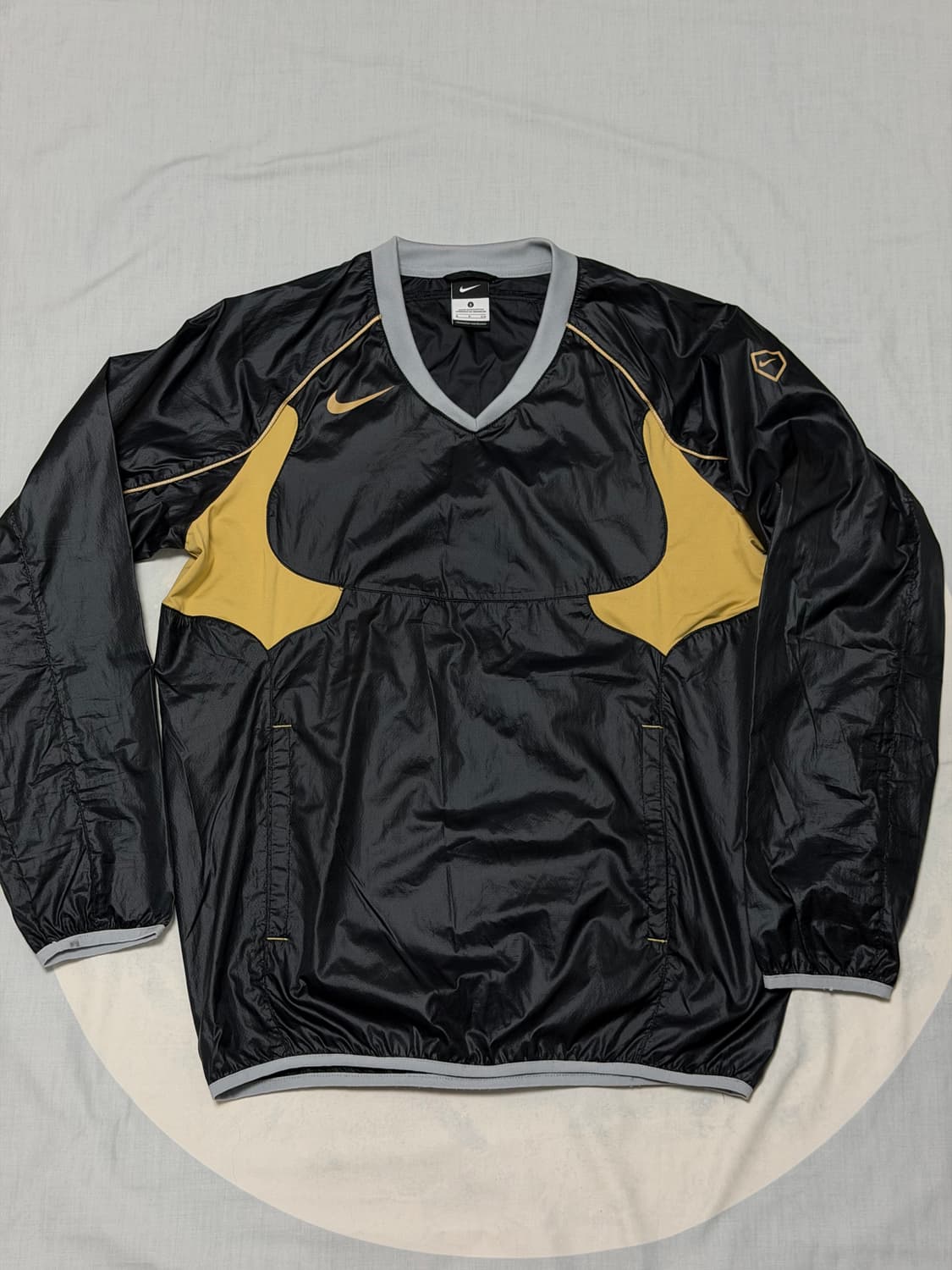 나이키 블랙/골드 바람막이 상의 상품이미지1