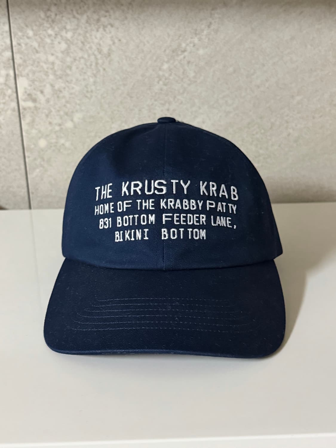 유니클로 UT x CPFM x 스폰지밥 UV 프로텍션 캡 네이비 상품이미지1