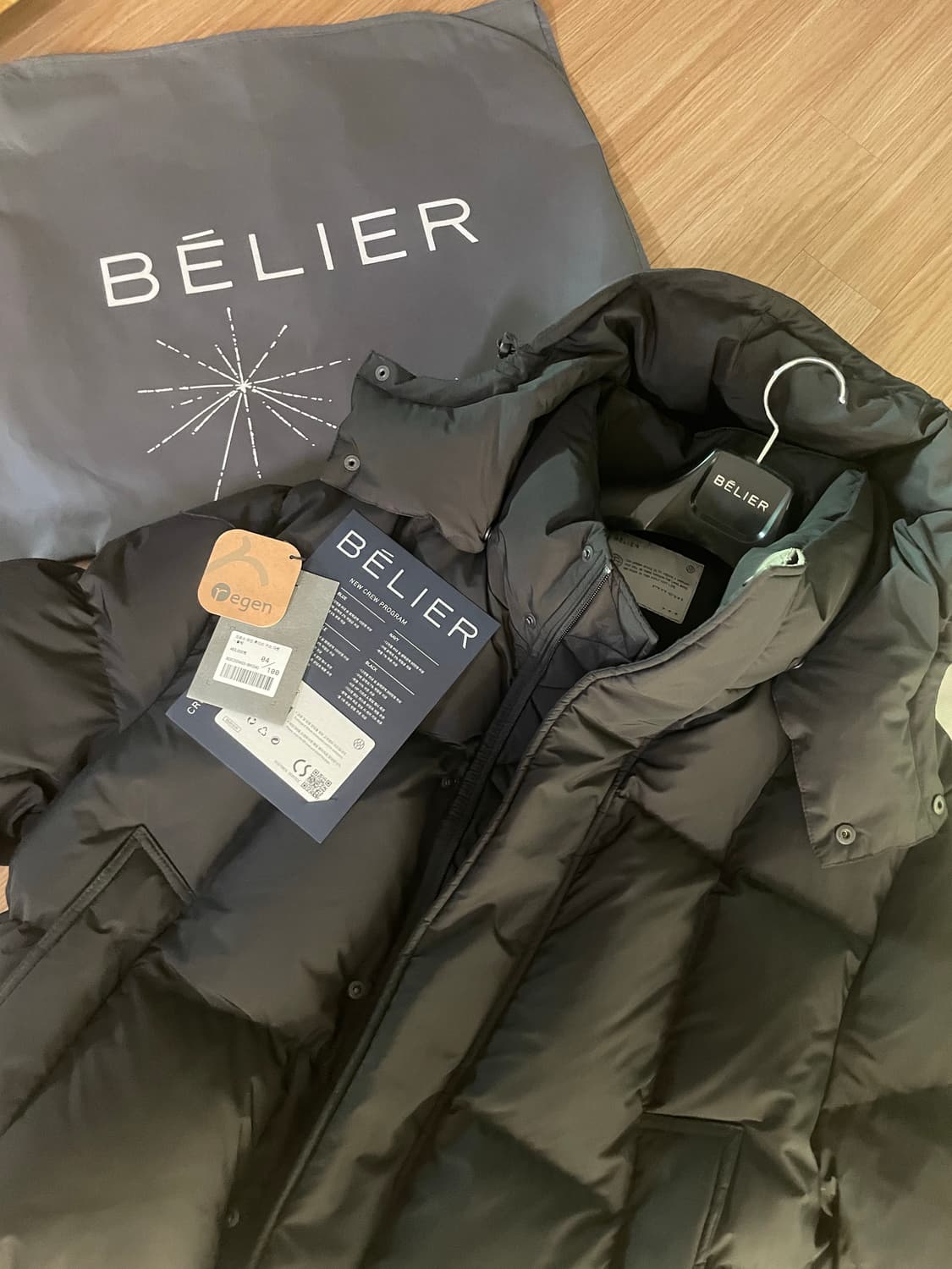 [100]벨리에 크로스 라인 패딩 후디드 구스 다운 블랙 상품이미지1