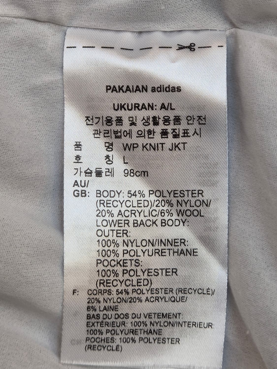 흰색 아디다스 여성 골프 방풍 자켓 L사이즈입니다. 니트 재질로 되어있고 상품이미지7