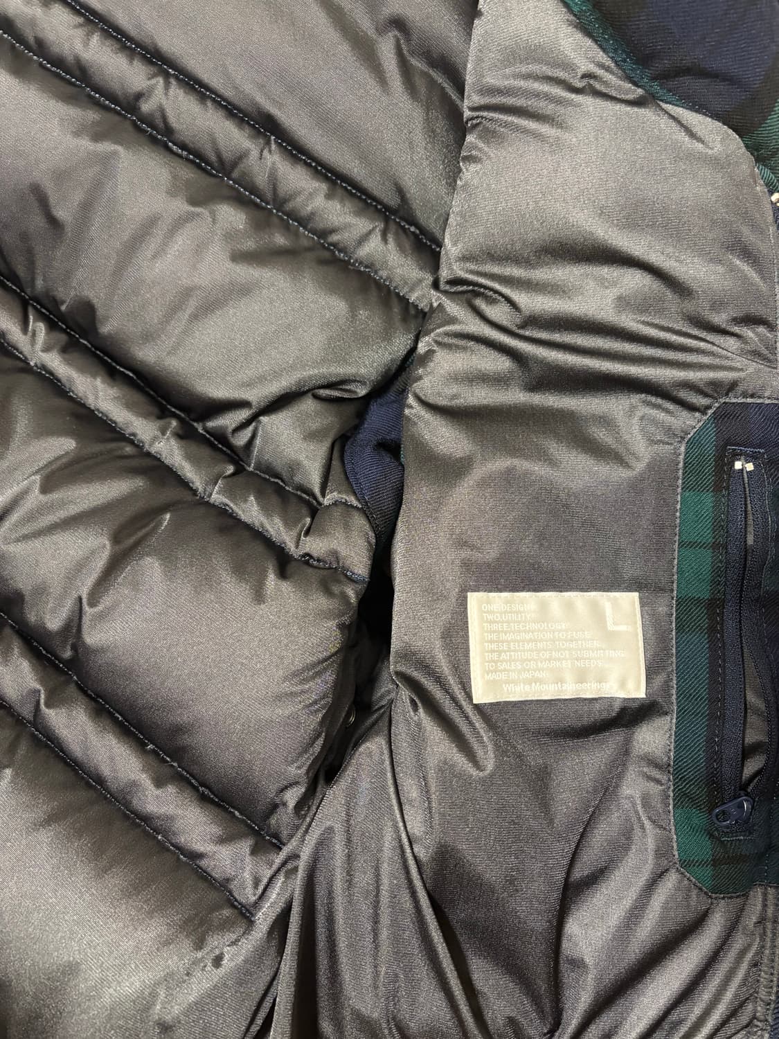 화이트마운티니어링 패딩 상품이미지4