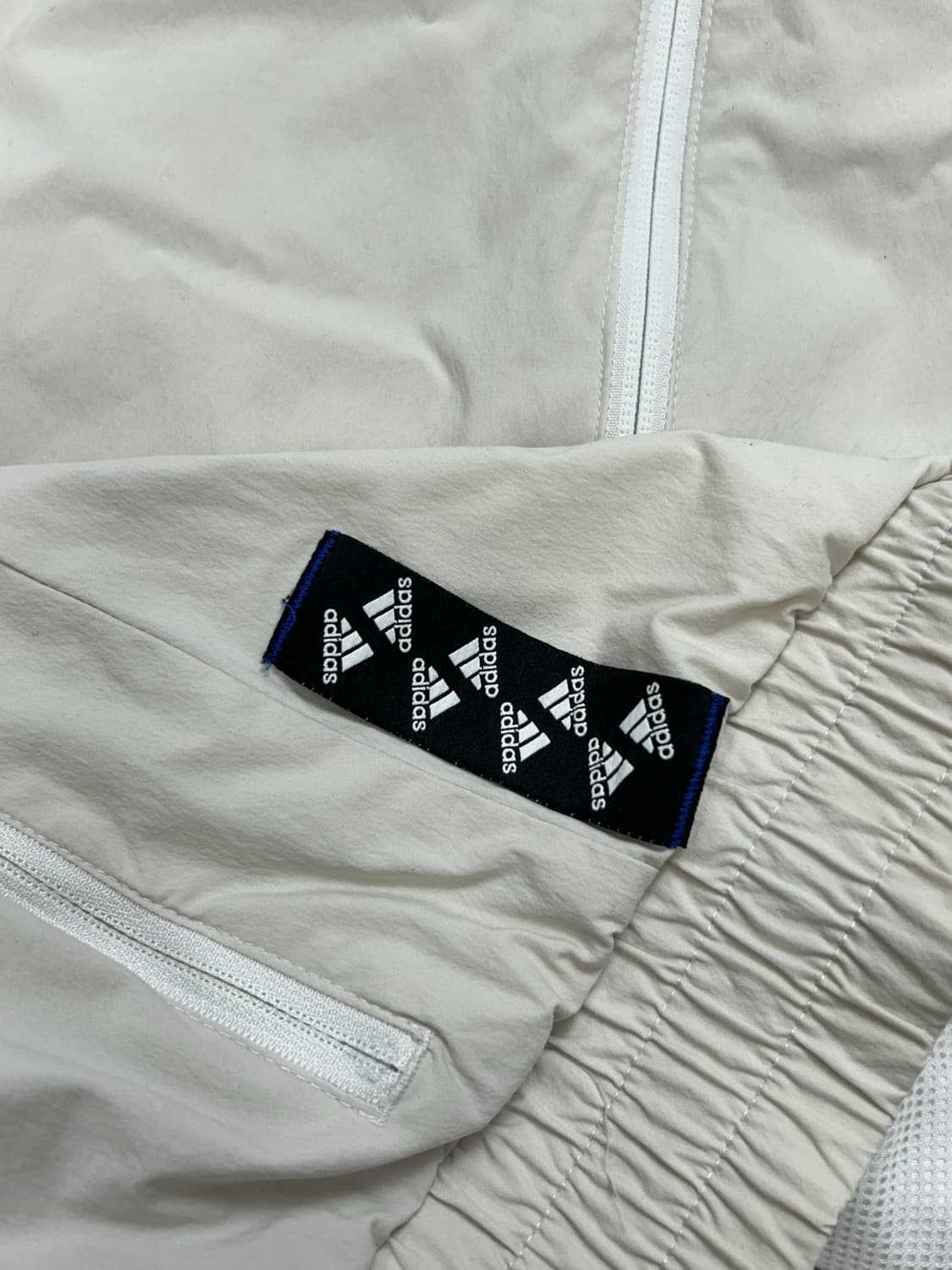 아디다스 크림 빅로고 우븐 바람막이 L 상품이미지7