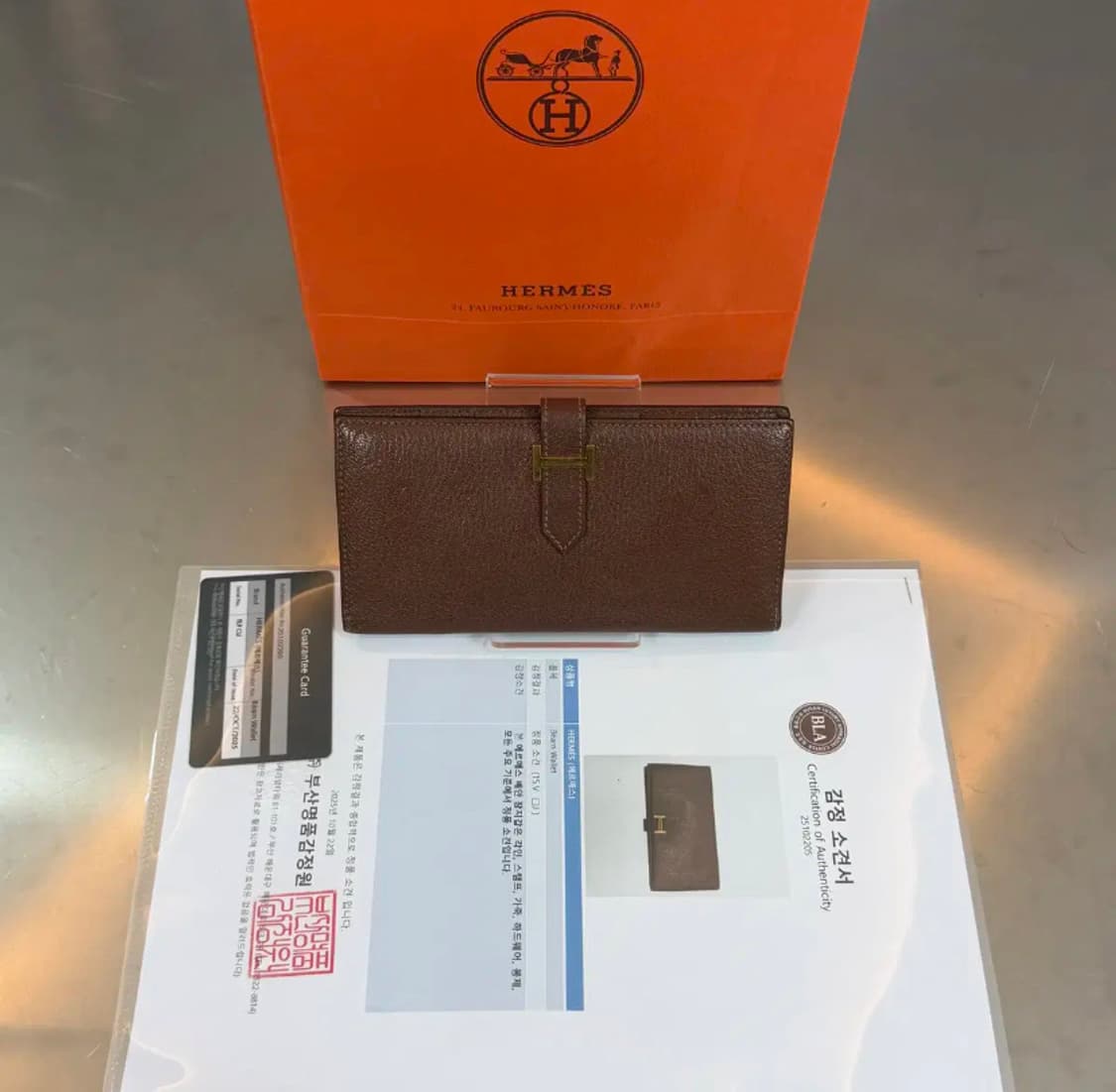 [정품] 에르메스 베안 브라운 골드 H 스위프트 고트스킨 장지갑 상품이미지1