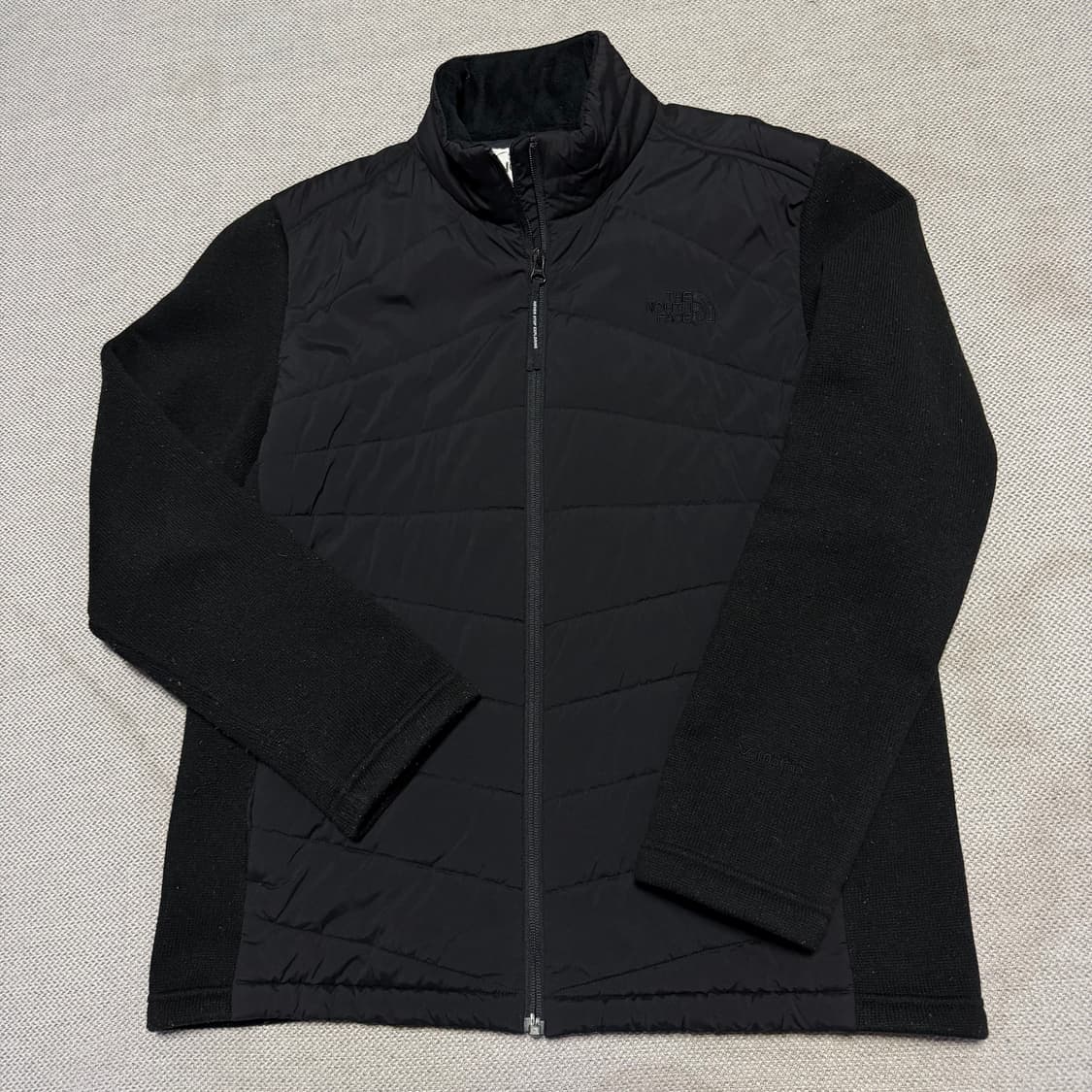 노스페이스 V-motion 니트 경량패딩 상품이미지1