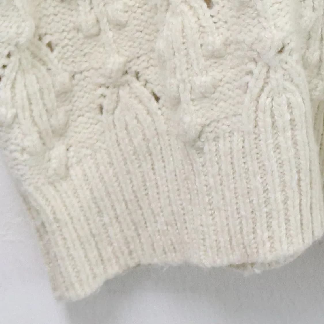 어스뮤직 폼폼 펀칭 니트 베스트 61972 상품이미지4