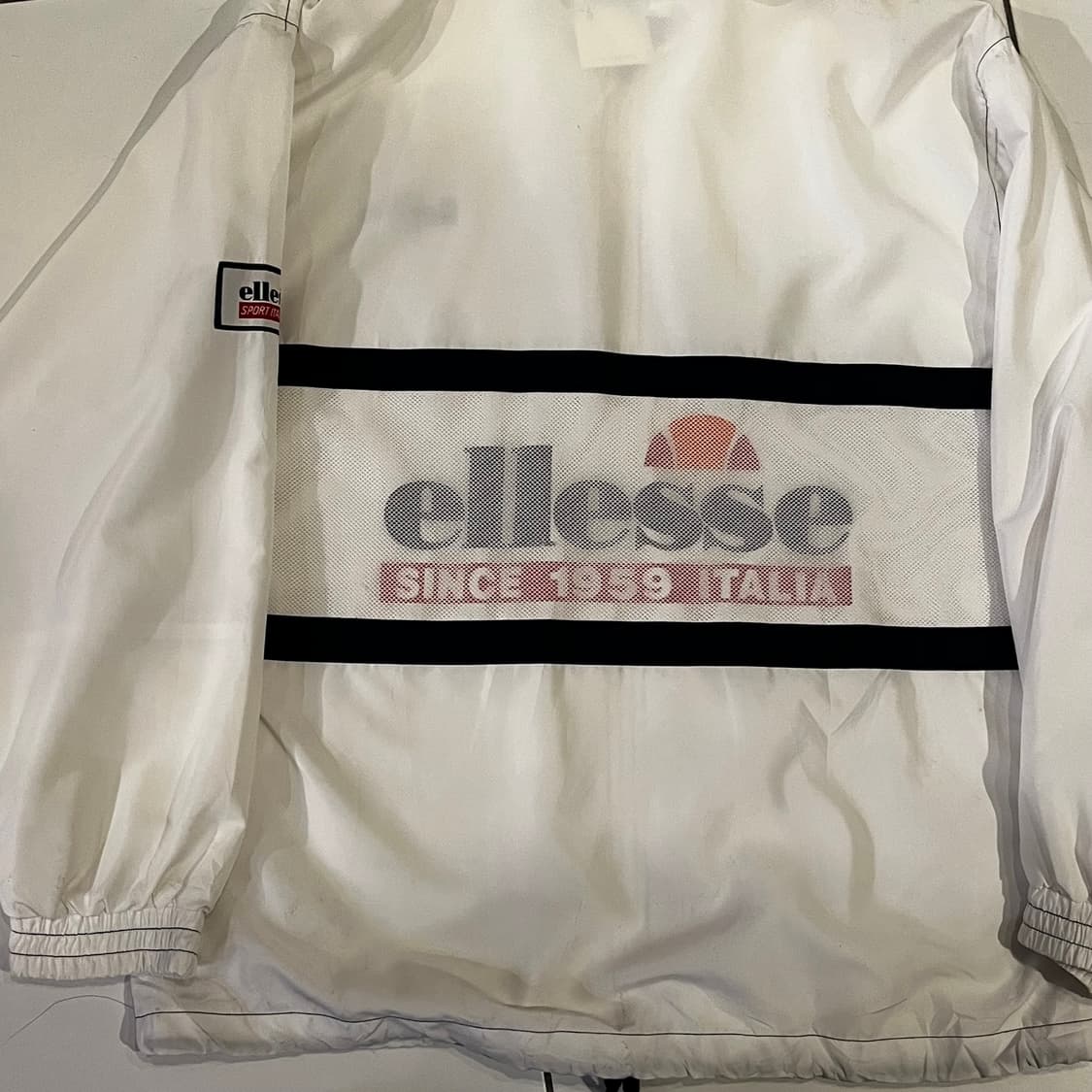 엘레쎄 화이트 빅로고 바람막이 상품이미지5