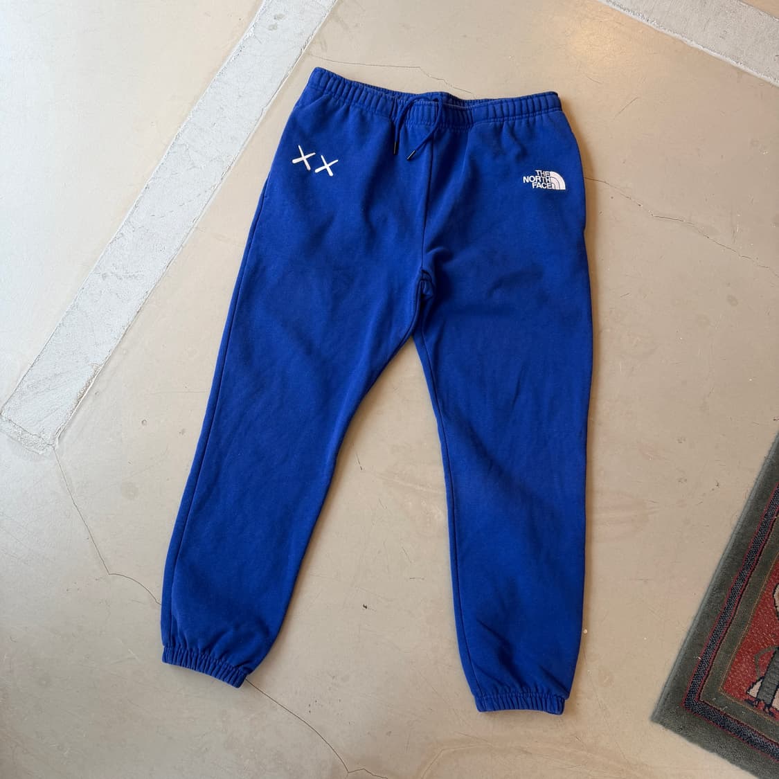 노스페이스 x 카우스 볼트 블루 스웻팬츠 상품이미지1