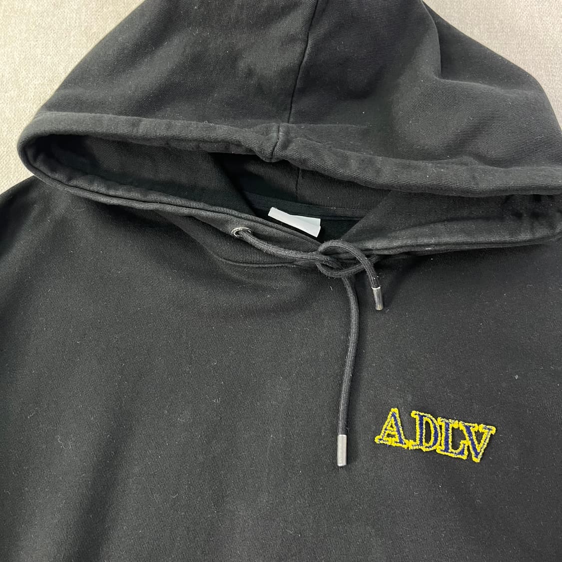 105 아크메드라비 자수로고 후드티 상품이미지3