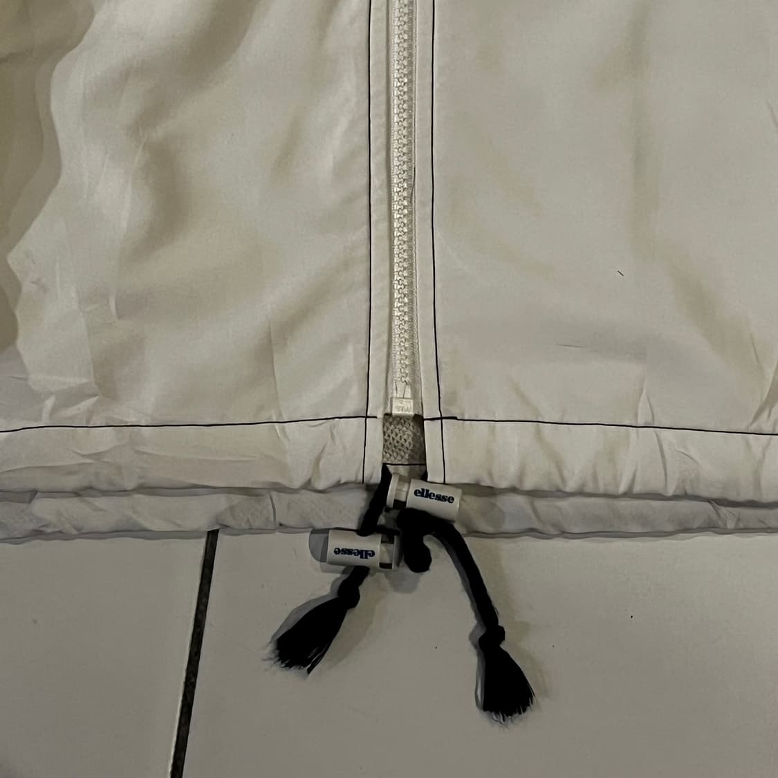 엘레쎄 화이트 빅로고 바람막이 상품이미지7