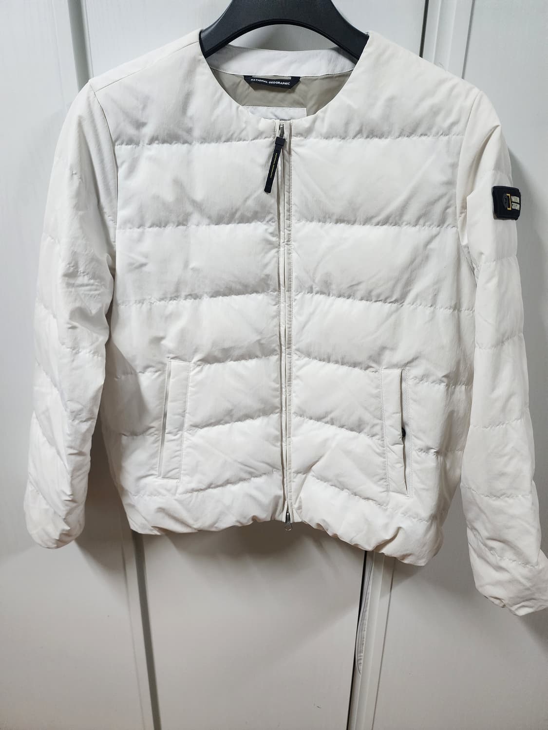 내셔널지오그래픽 여성 U넥 경량 패딩 아이보리 100 상품이미지1