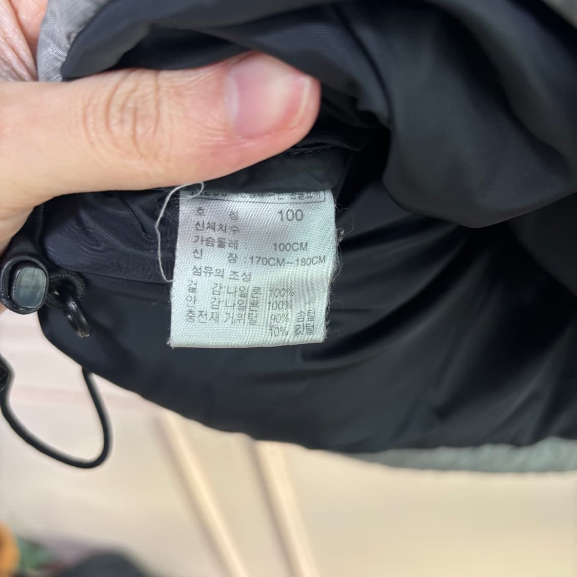 노스페이스 700 센터로고 눕시 구스다운 패딩 실버 그레이 상품이미지4