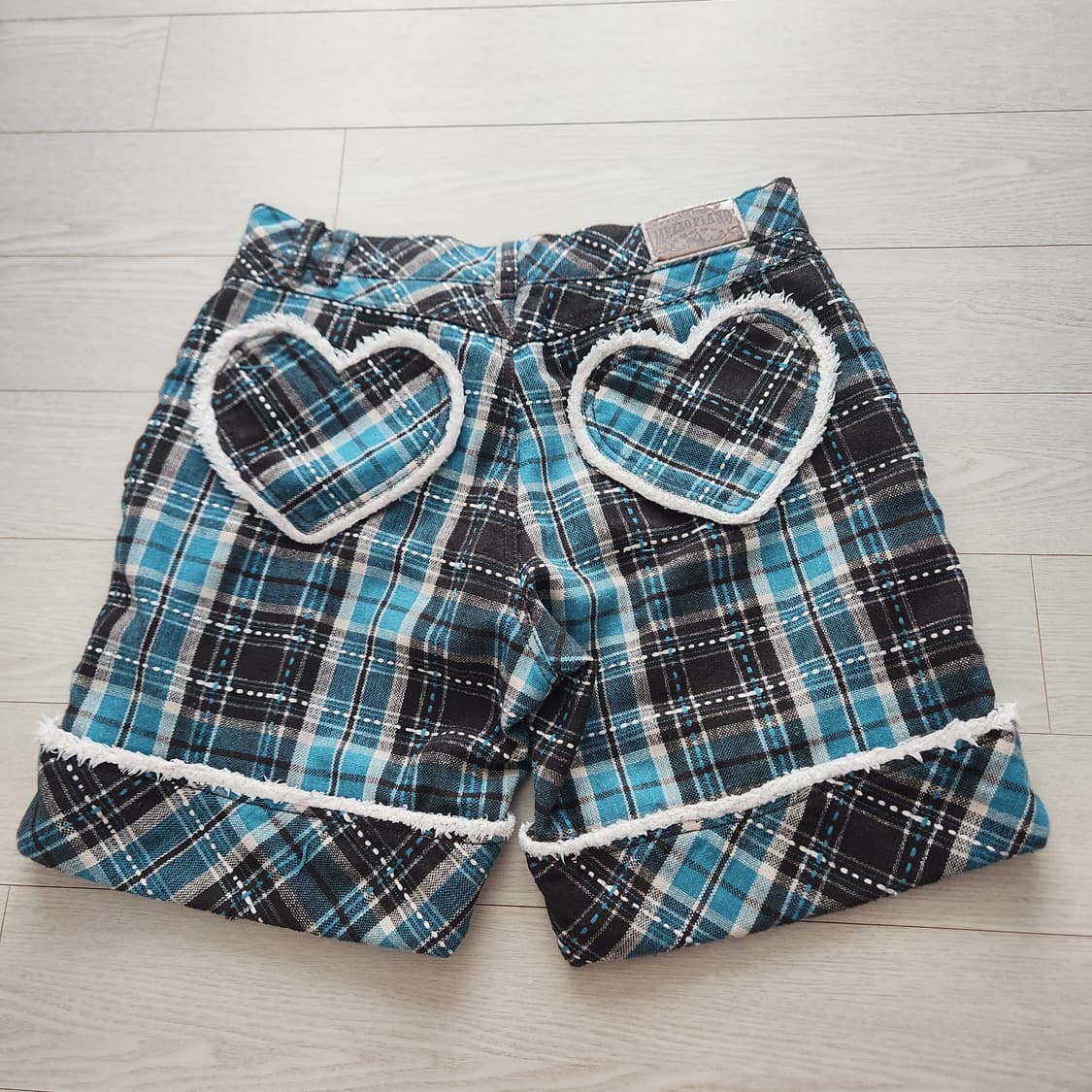 메조피아노 캐캐체깔 하트 퍼 포켓  체크 반바지 상품이미지1