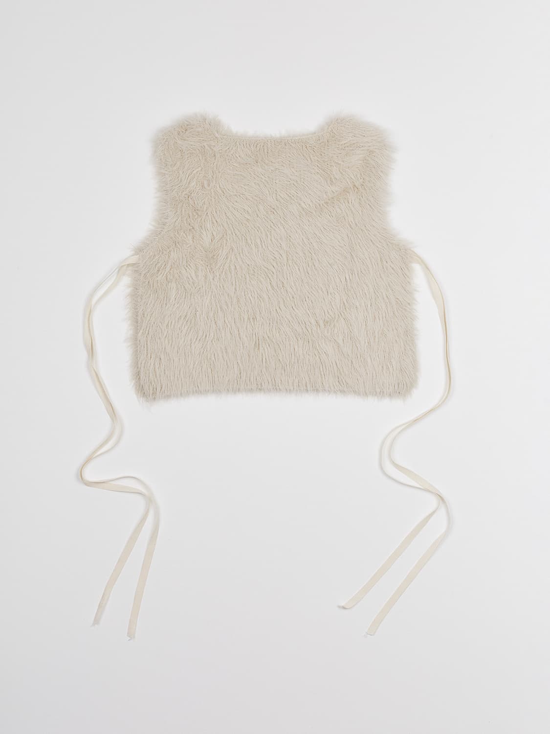 낫띵에브리띵 OPEN SIDE VEGAN FUR VEST IN IVOR 상품이미지1