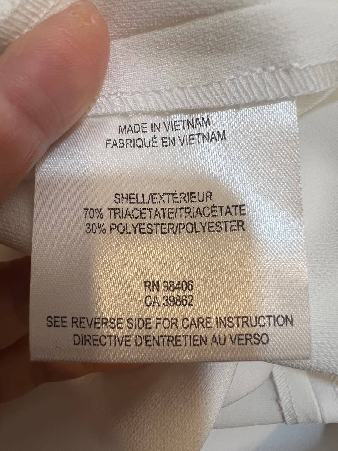 띠어리 여성 아이보리 하이넥 슬리브리스 블라우스 상품이미지6