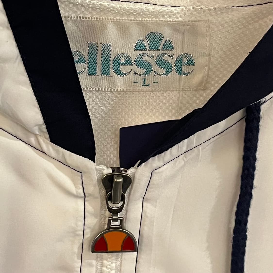 엘레쎄 화이트 빅로고 바람막이 상품이미지6