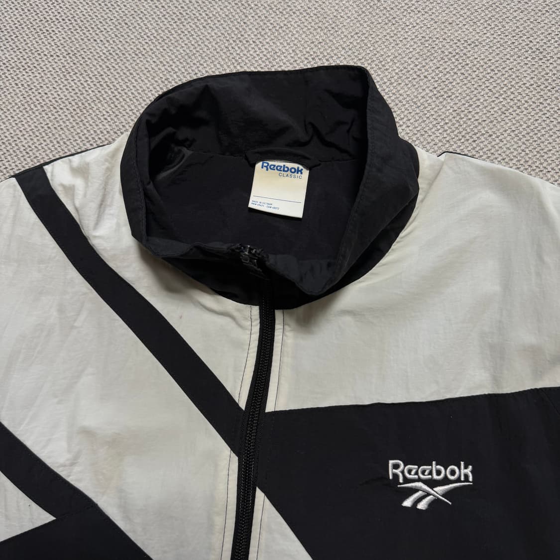 리복 빅로고 패턴 바람막이 자켓 상품이미지2