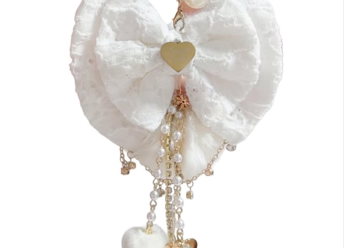 스쿠쿠빈티지 리본 폼폼이 퍼 키링 히메갸루 라떼갸루 상품이미지1