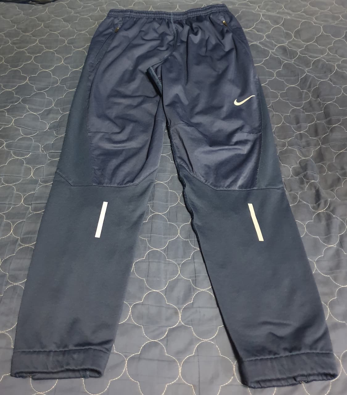 나이키 쉴드 솔로스우시 밑단집업 우븐 조거팬츠 네이비 (M) 상품이미지1