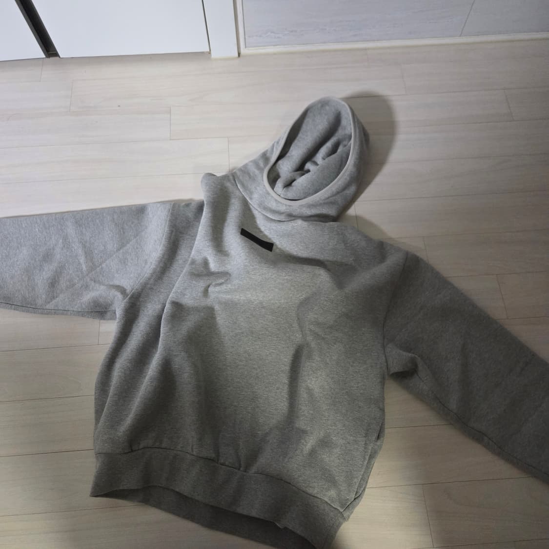 에센셜 풀오버 후드 다크 헤더 오트밀 - 24SS 상품이미지1