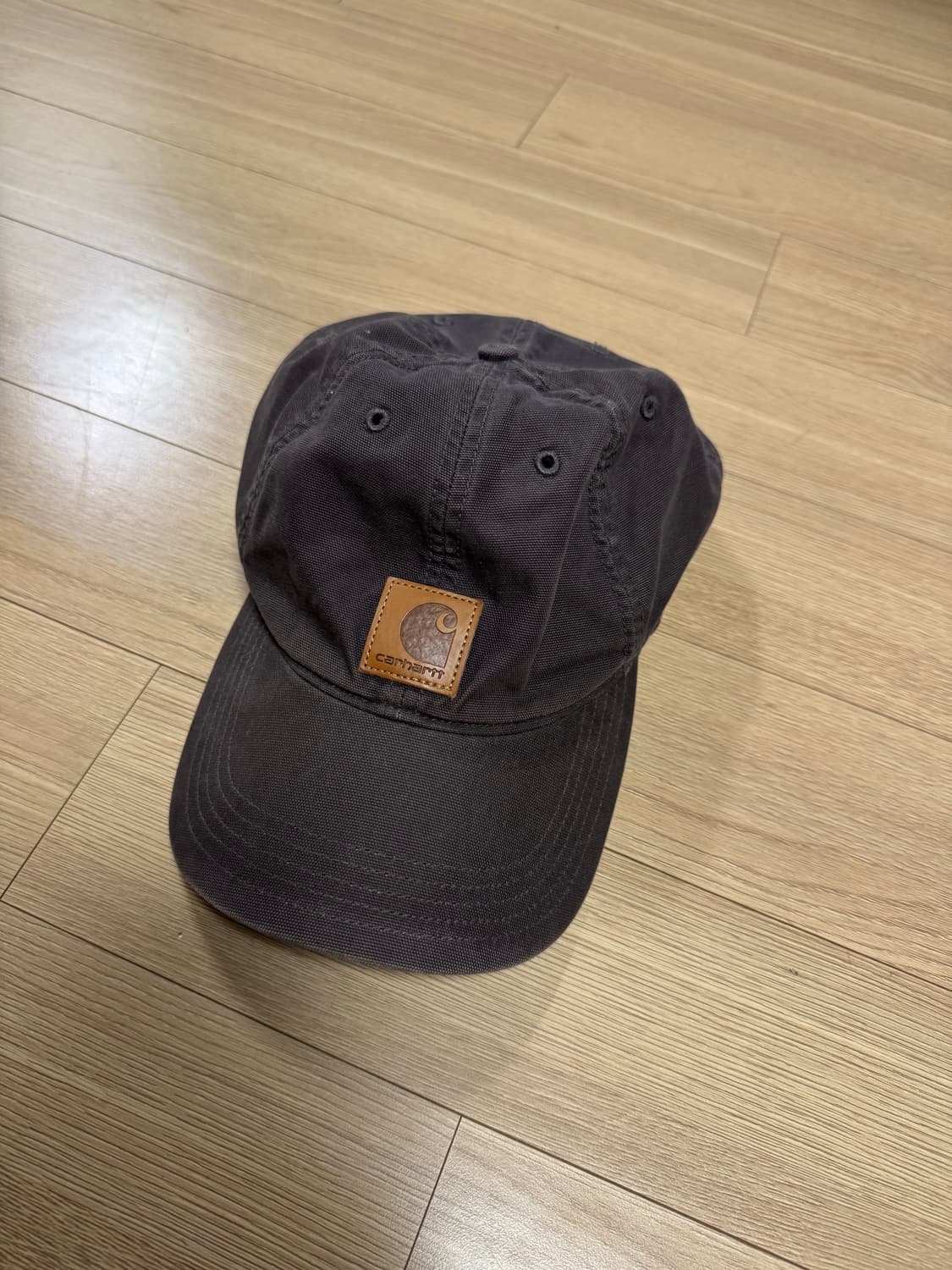 칼하트 캔버스 레더 패치 캡 다크브라운 상품이미지1