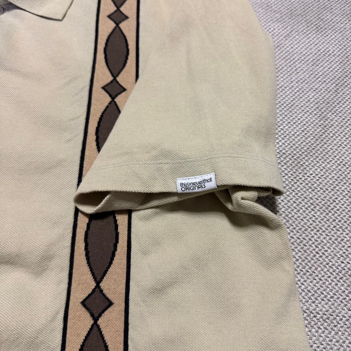 디스이즈네버댓 패턴 카라 반팔 가디건 상품이미지3