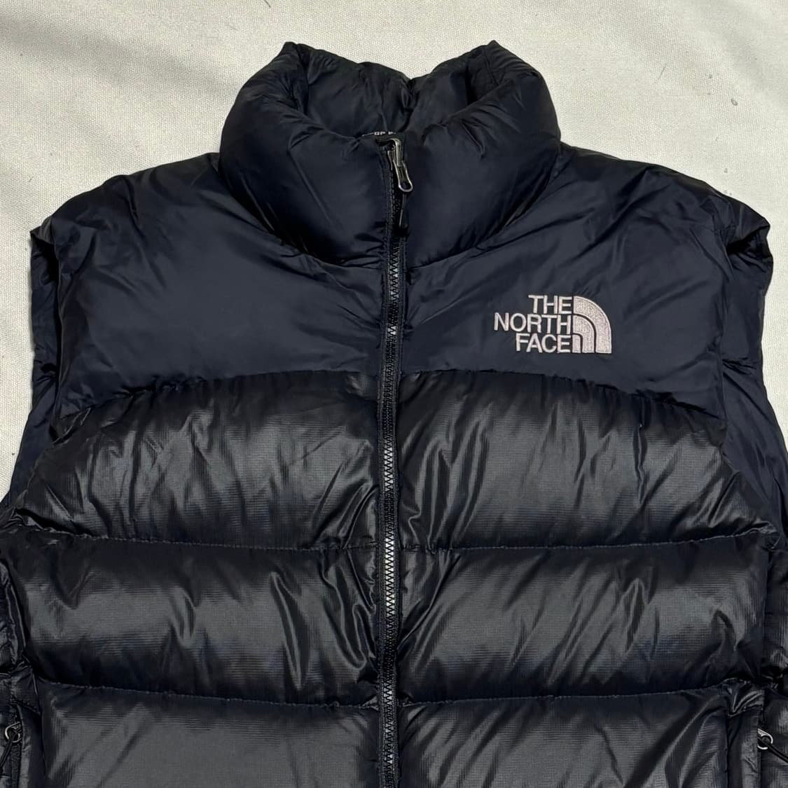 100 노스페이스 700 눕시 패딩 베스트 상품이미지1