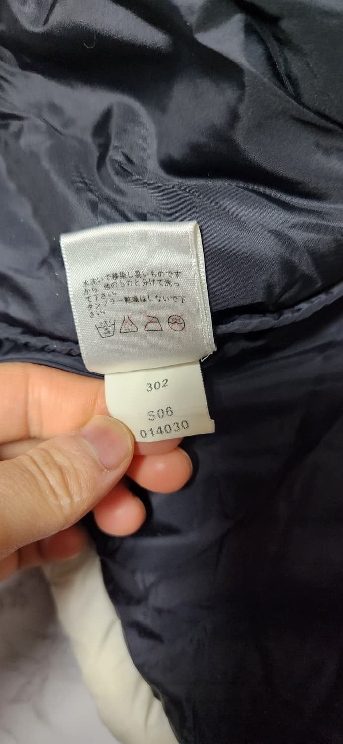 노스페이스 700 눕시 화이트x블랙 패딩 자켓 상품이미지7