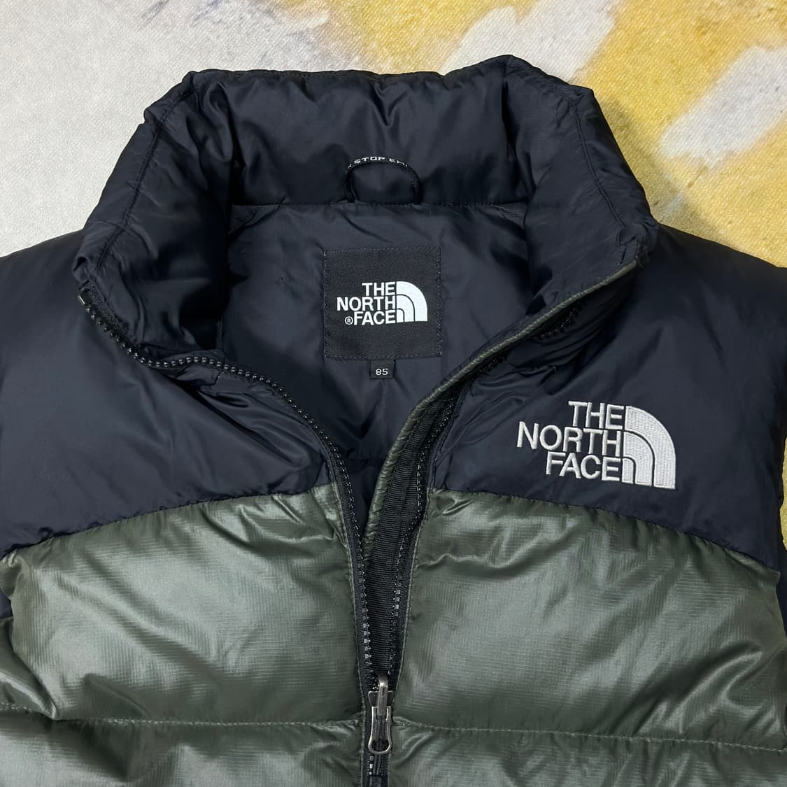 노페700 눕시 패딩조끼 카키 상품이미지3