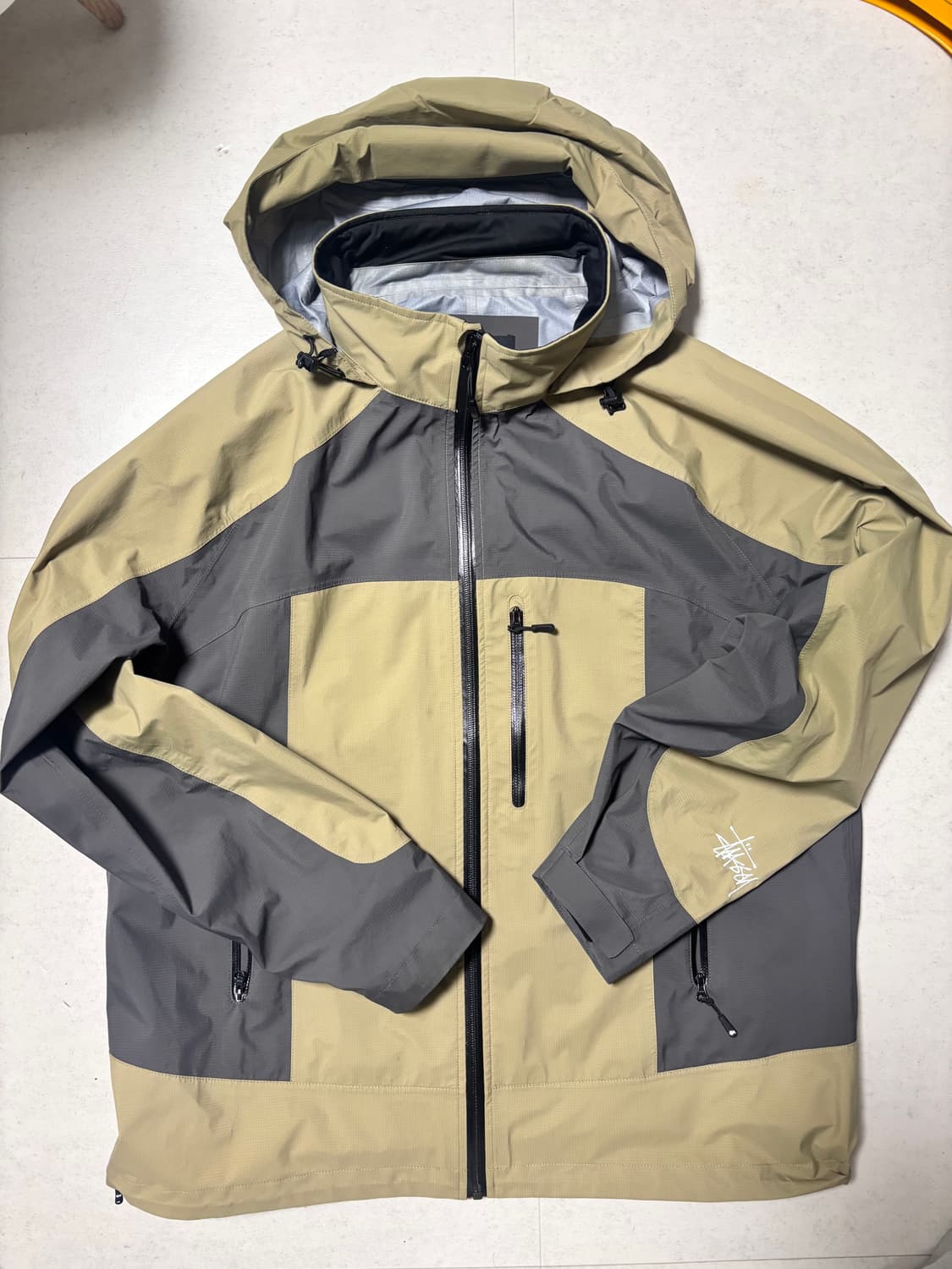 스투시 테입드 심 레인 바람막이(모자 안으로 넣기 가능) 상품이미지1