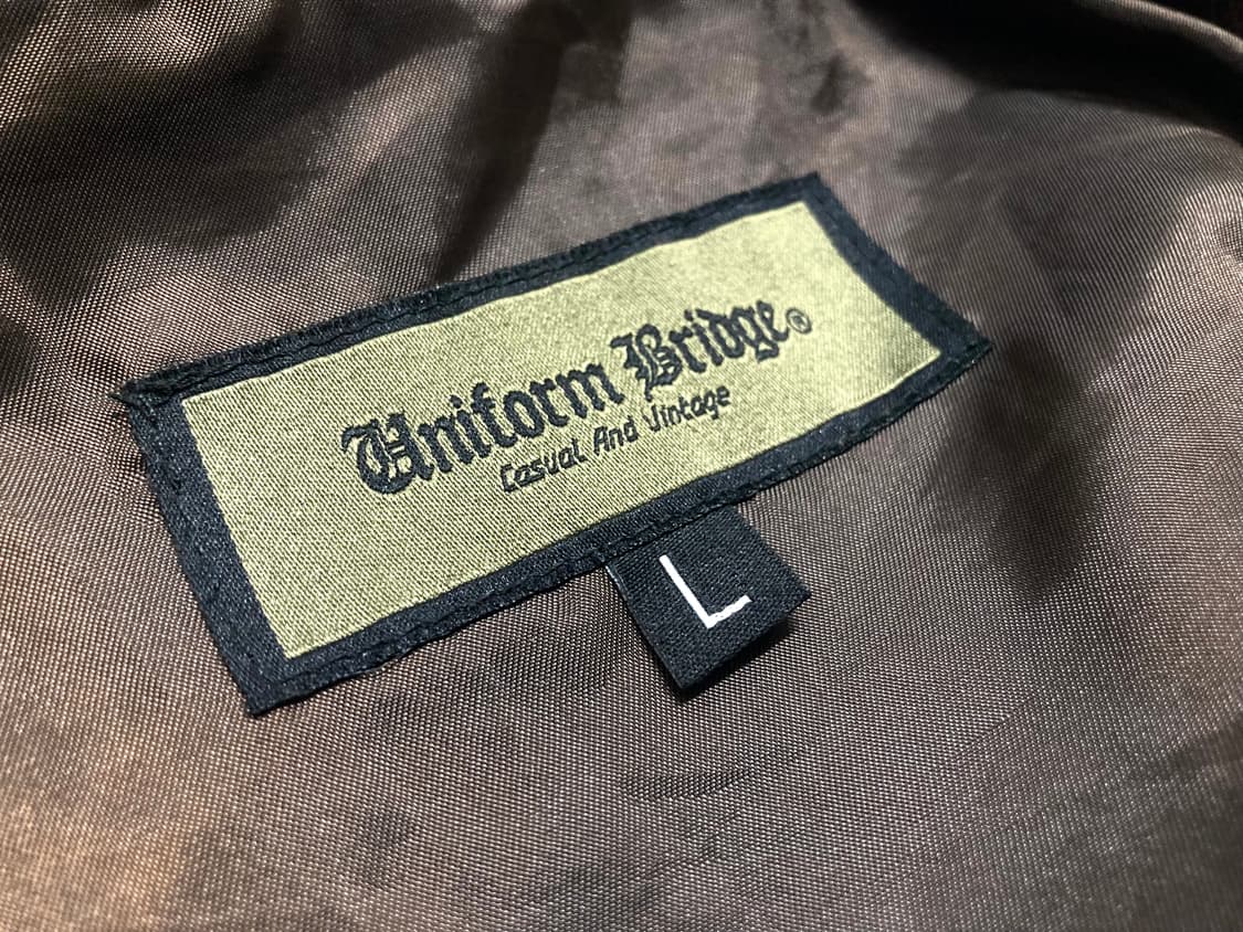 (거의 새것)유니폼브릿지 23fw 비건레더 A-2 자켓 L 100-105 상품이미지7