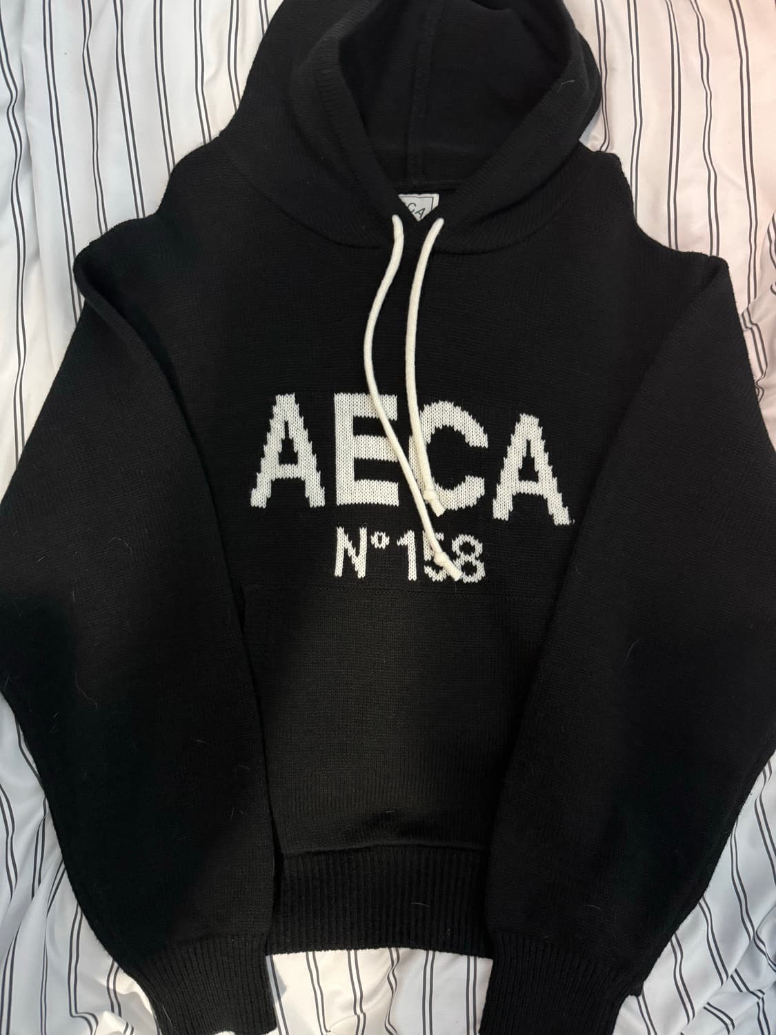 에이카화이트 빅로고 울 니트후드티 상품이미지1