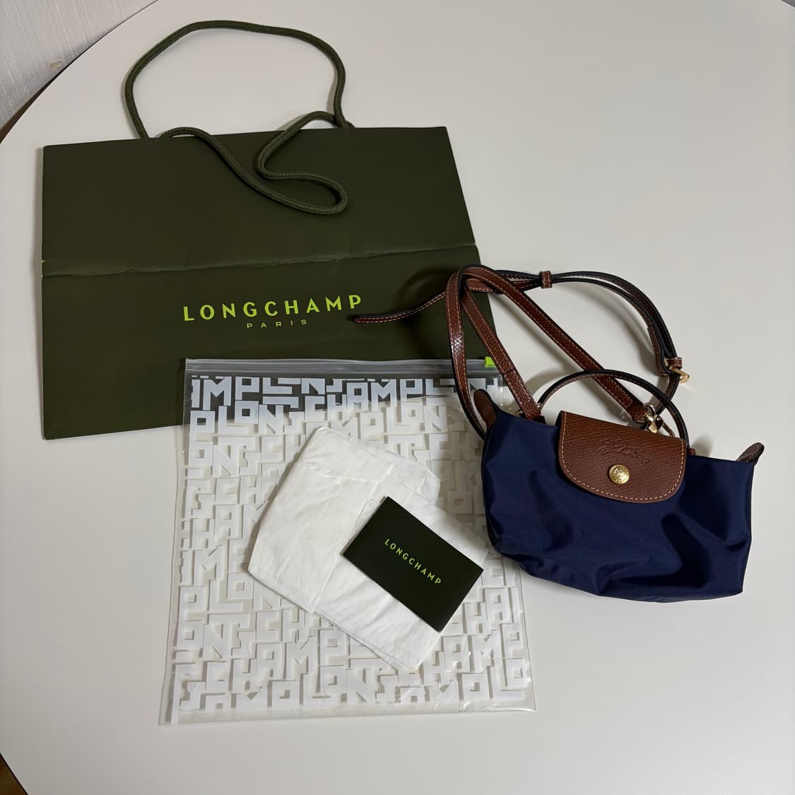 롱샴 르 플리아쥬 오리지널 미니 핸들 파우치 상품이미지1