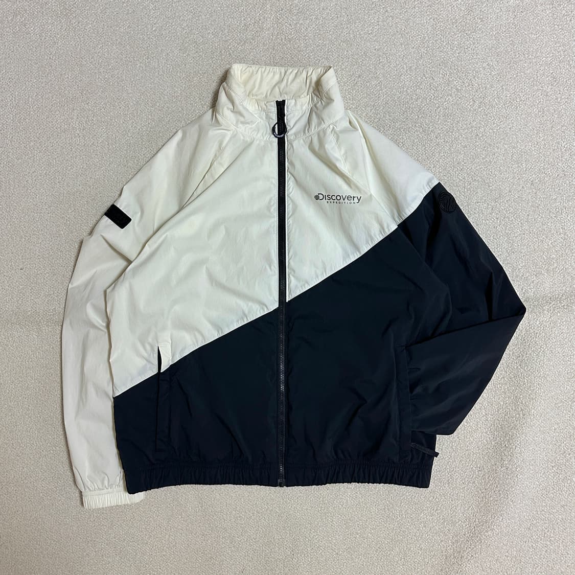 디스커버리 익스페디션 여성 이노블럭 바람막이 상품이미지1