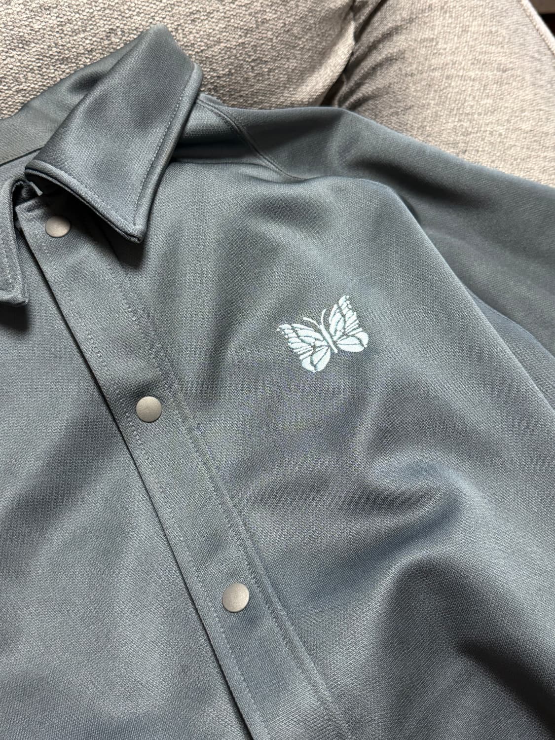 니들스 스튜디오스 별주 트랙 스냅 자켓 상품이미지3