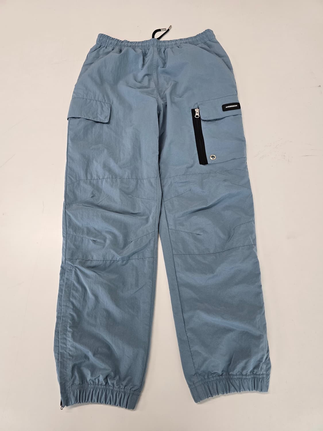 앤더슨벨 카고 웜업 팬츠 더스티블루 M 상품이미지1