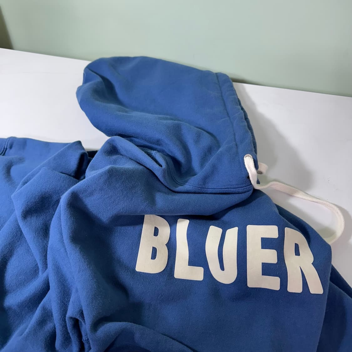 L 네이머클로딩 BLUER로고 스카이네이비 스웻후드티 상품이미지1