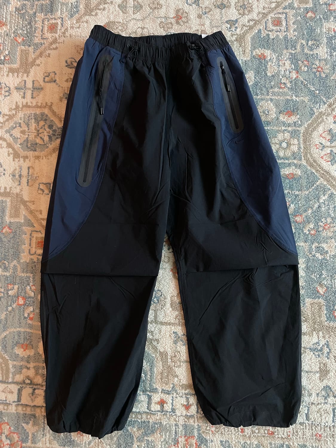 나이키 테크 드라이핏 우븐 컬러 블록 오버사이즈 블랙 팬츠 (새제품. L 상품이미지1