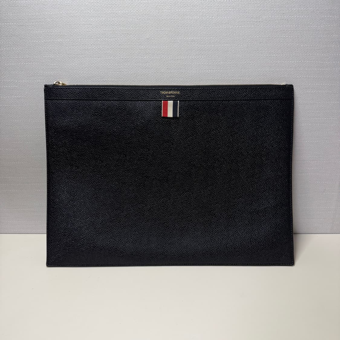 [정품/S+급] 톰브라운 페블 그레인 레더 클러치 라지 상품이미지1