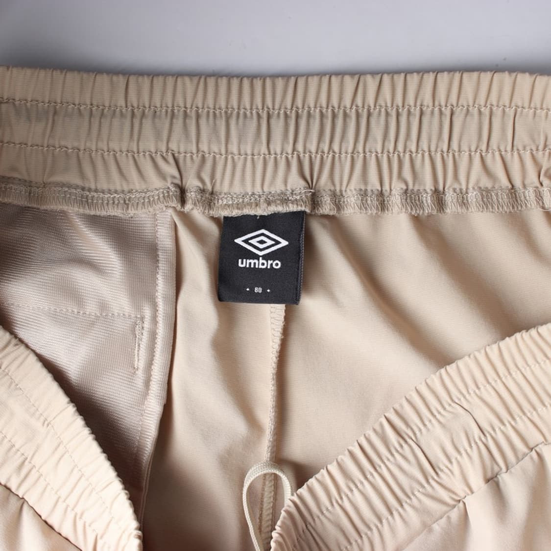 엄브로 베이지 사이드라인 우븐 조거팬츠 상품이미지6