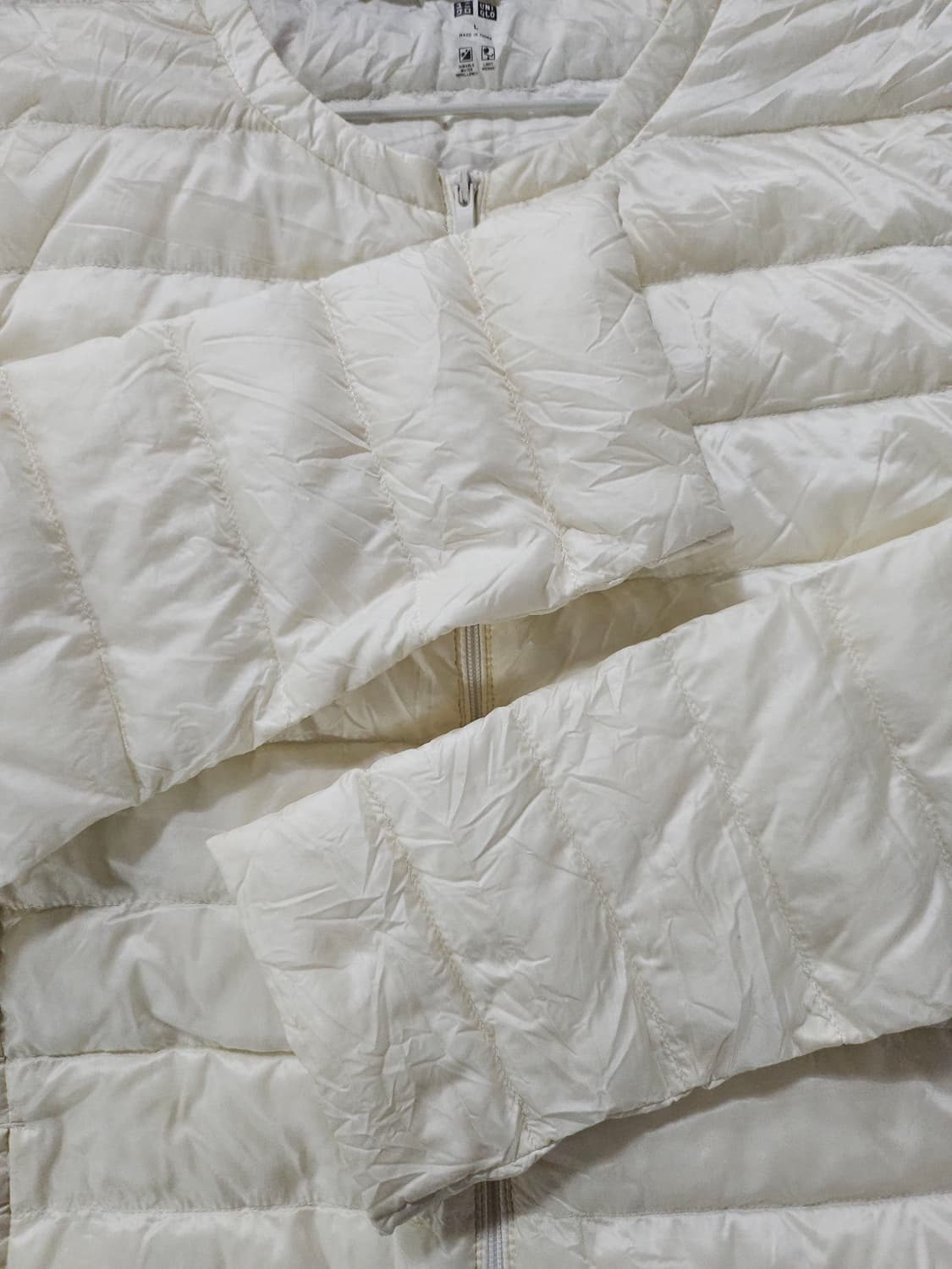 유니클로 여성 경량 패딩 아이보리  L 상품이미지4