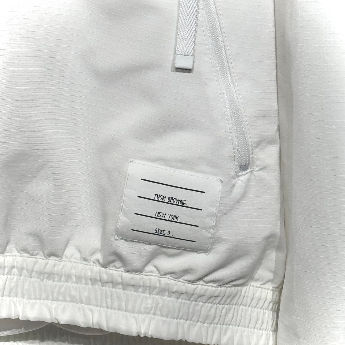 [새상품급/3] 톰브라운 립스탑 메쉬 사선완장 바람막이 상품이미지4