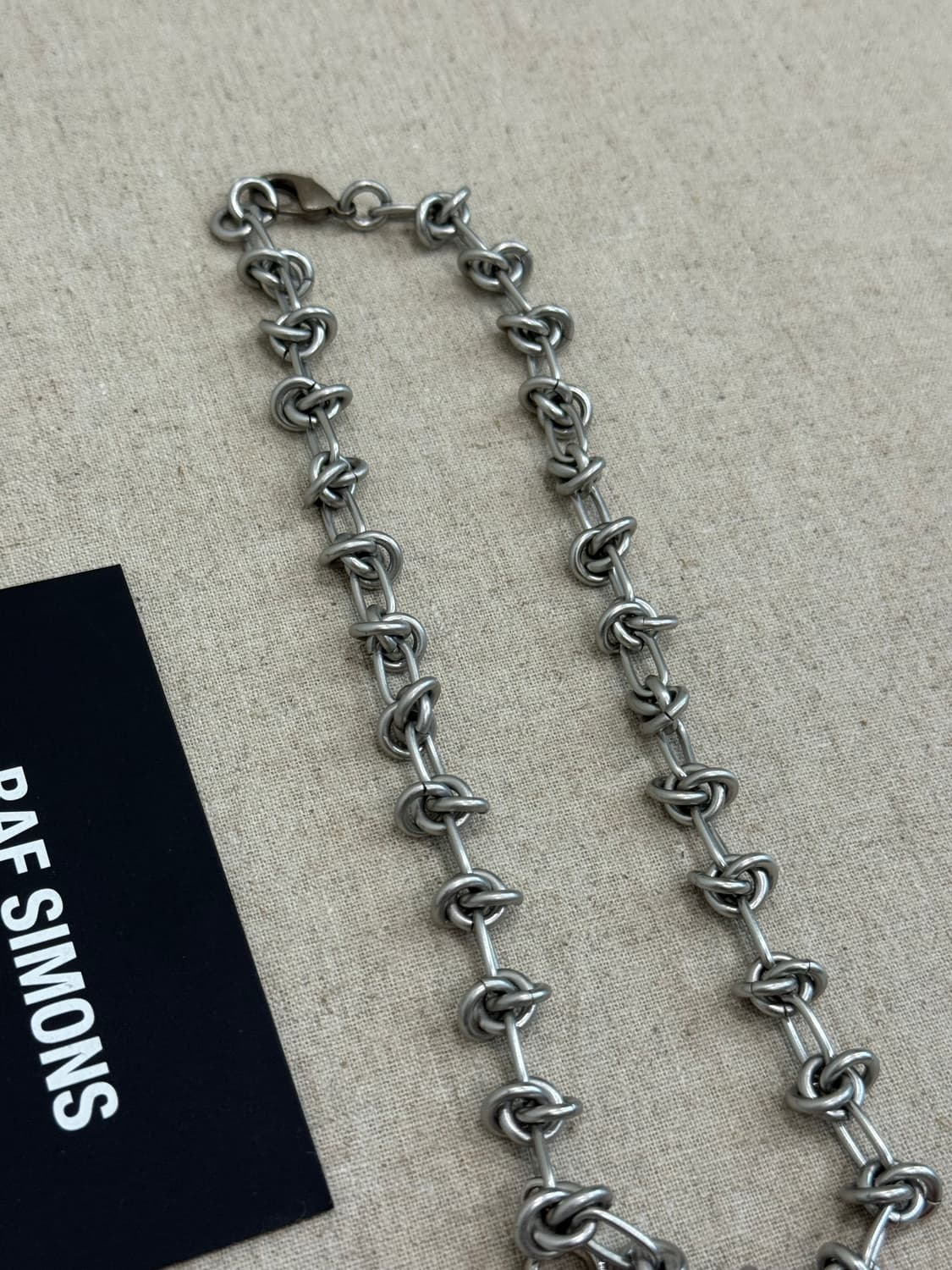 라프시몬스 20-21aw 노트 참 목걸이 상품이미지3