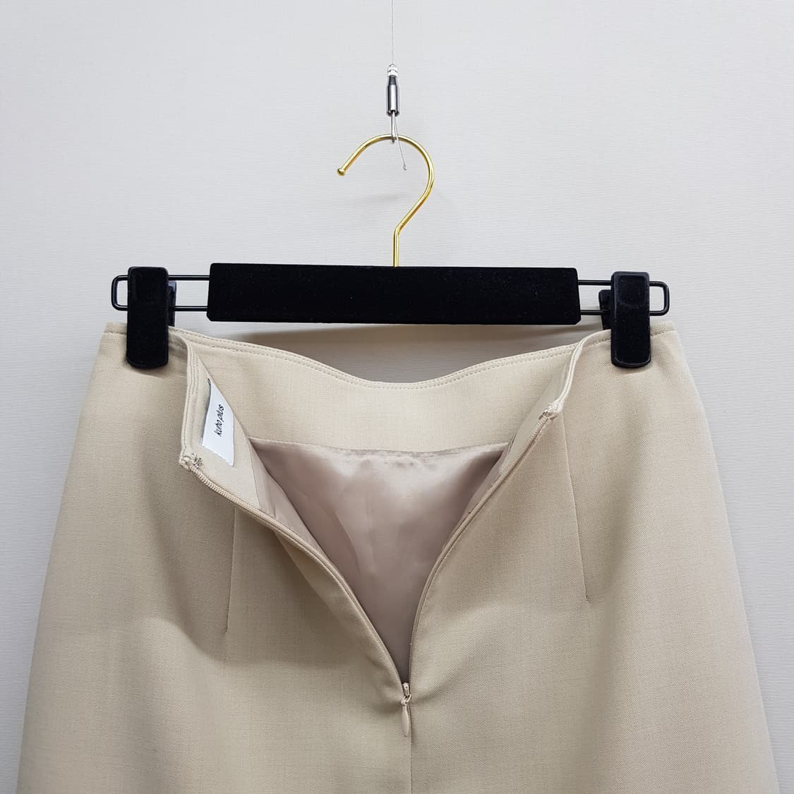 구호플러스 2025 랩 스타일 미디 스커트 1사이즈 상품이미지4