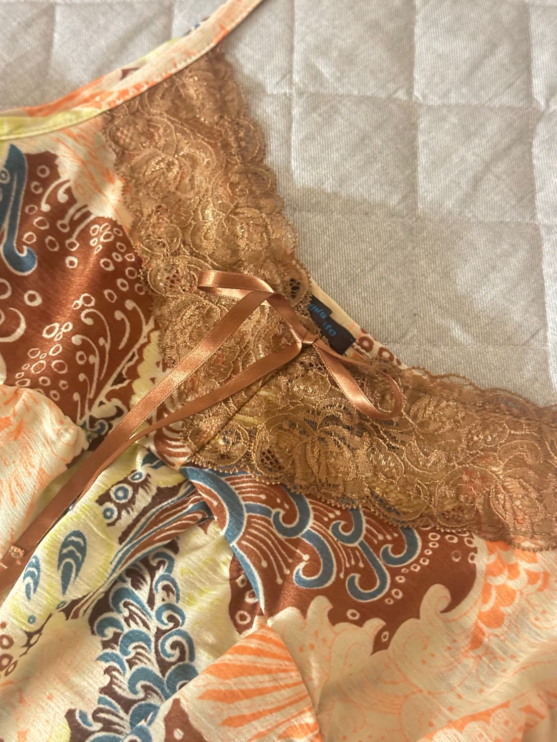 오리엔탈 슬리브리스 탑 상품이미지1