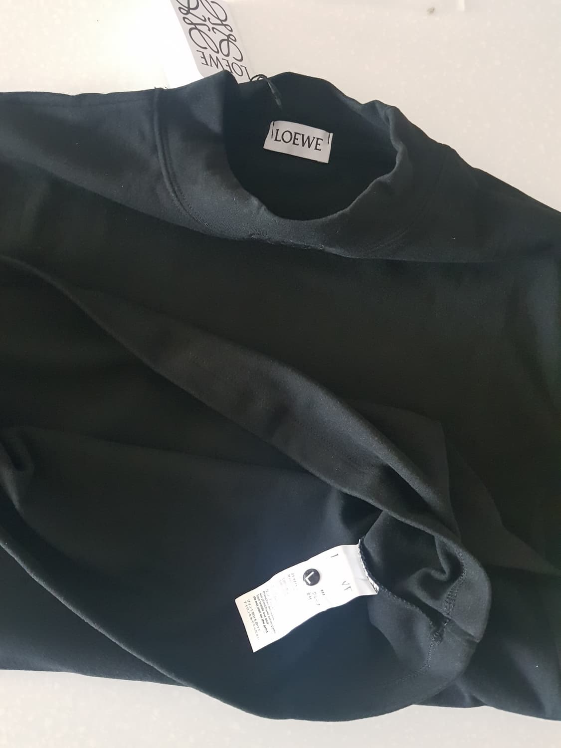 로에베(LOEWE)의 블랙 하이넥 탑 ,반팔 상품이미지1