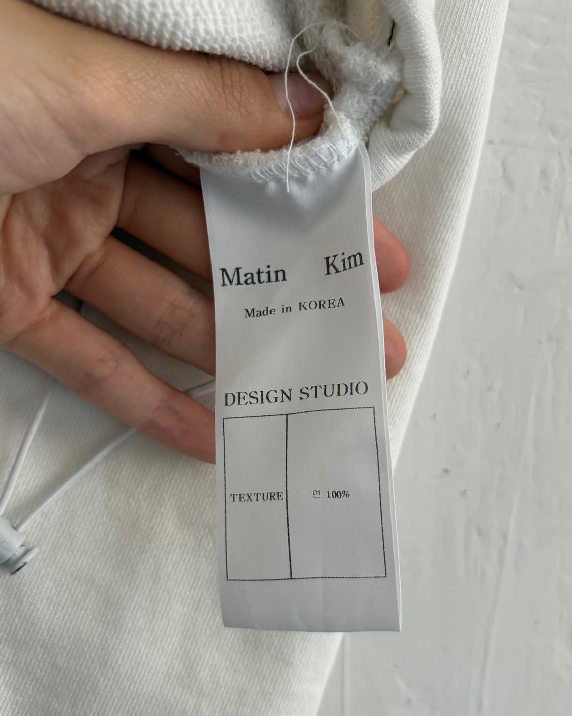 Matin Kim 마뗑킴 화이트 스티치 크롭 볼레로 후드티 상품이미지5