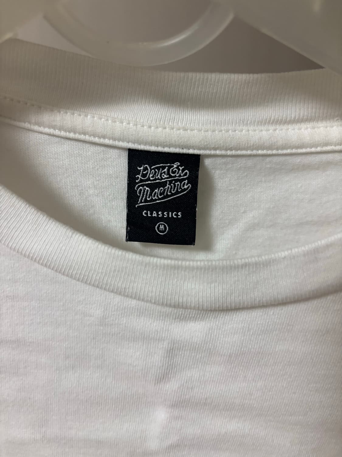 데우스 흰색 슬리브 판매합니다 사이즈 미디움 상품이미지5