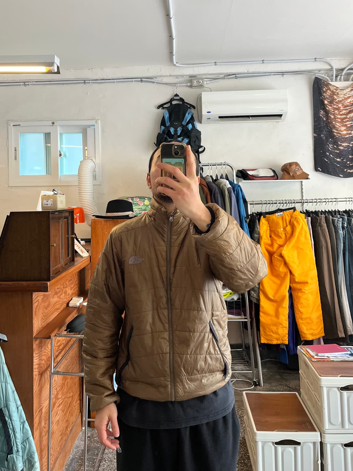 노스페이스 센터로고 브라운 경량패딩  상품이미지1